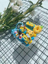 Load image into Gallery viewer, Minions Decoden Earbud Case For Any Model with Keychain
